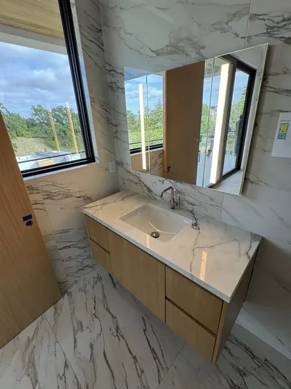 Bathroom Remodeling Project featuring showers, tile & backsplashes — American Remodeling