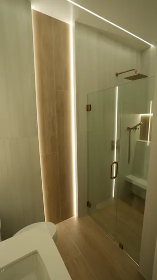 Bathroom Remodeling Project featuring showers, tile & backsplashes — American Remodeling
