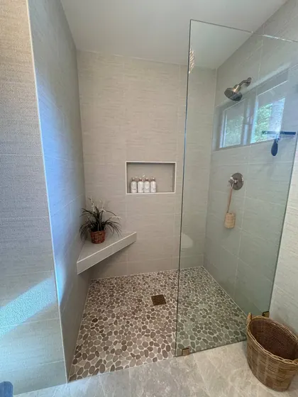 Bathroom Remodeling Project featuring showers, tile & backsplashes — American Remodeling