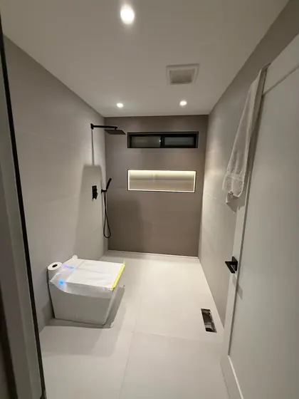 Bathroom Remodeling Project featuring showers, tile & backsplashes — American Remodeling