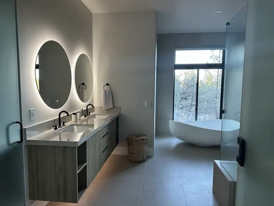 Bathroom Remodeling Project featuring bathtubs, showers — American Remodeling
