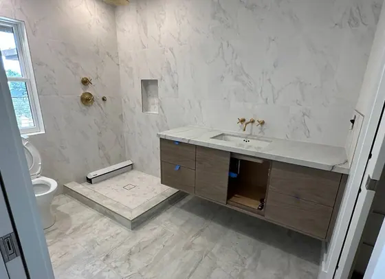 Bathroom Shower & Custom Vanity — American Remodeling project gallery