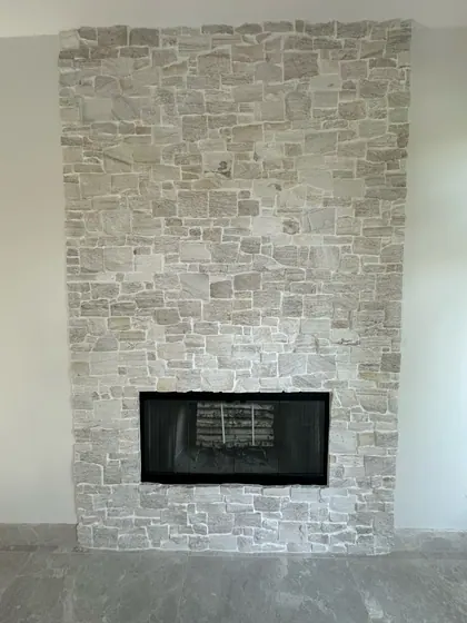 Fireplace Remodeling Project featuring tile & backsplashes — American Remodeling