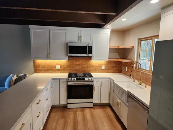Kitchen Remodeling Project featuring tile & backsplashes, cabinets & storage — American Remodeling