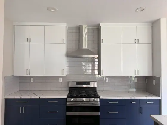Kitchen Remodeling Project featuring tile & backsplashes, cabinets & storage — American Remodeling